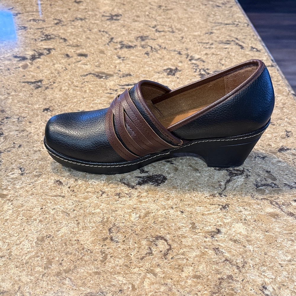 Black leather clogs